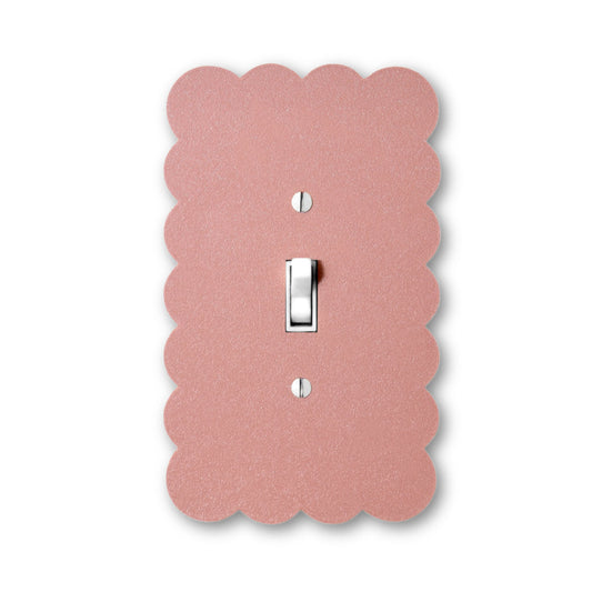 Lellume Cloud Bubble Switch Plate in a dusty pink color with scalloped edges.