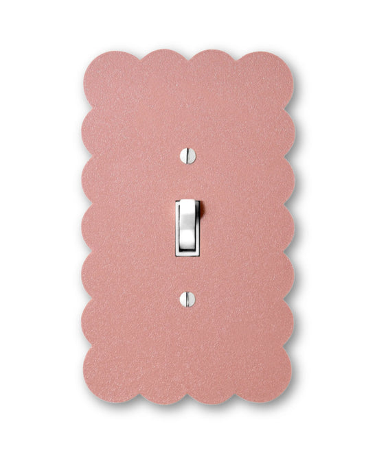Lellume Cloud Bubble Switch Plate in a dusty pink color with scalloped edges.